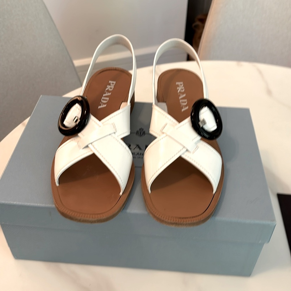 PRADA white leather slingback sandal with dark brown buckle. Excellent condition
